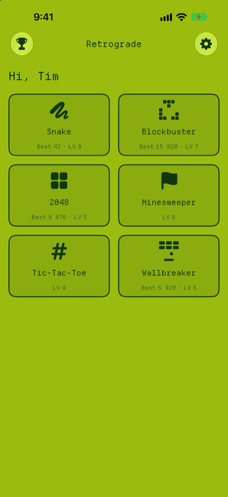 The Retrograde game hub in the classic green theme, showing six game tiles with best scores and levels